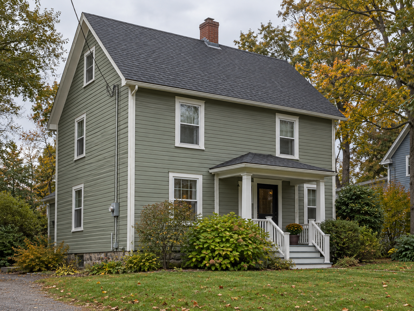 Older home showing roof, chimney and exterior electrical service
